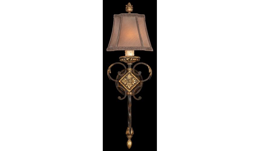 Lighting Wall sconce in antiqued finish. Features hand sewn silk shade with braided trim.
