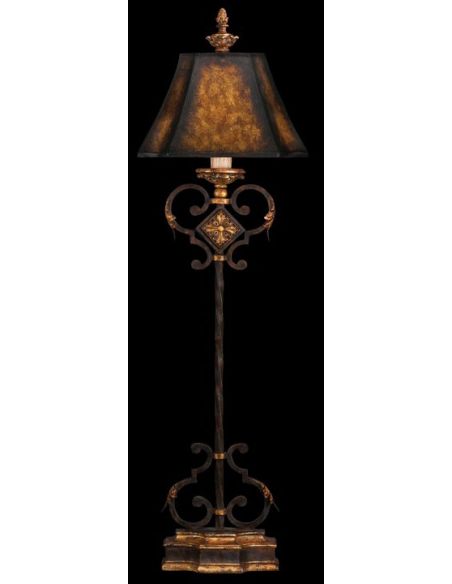 Console lamp of antiqued iron with gold leaf