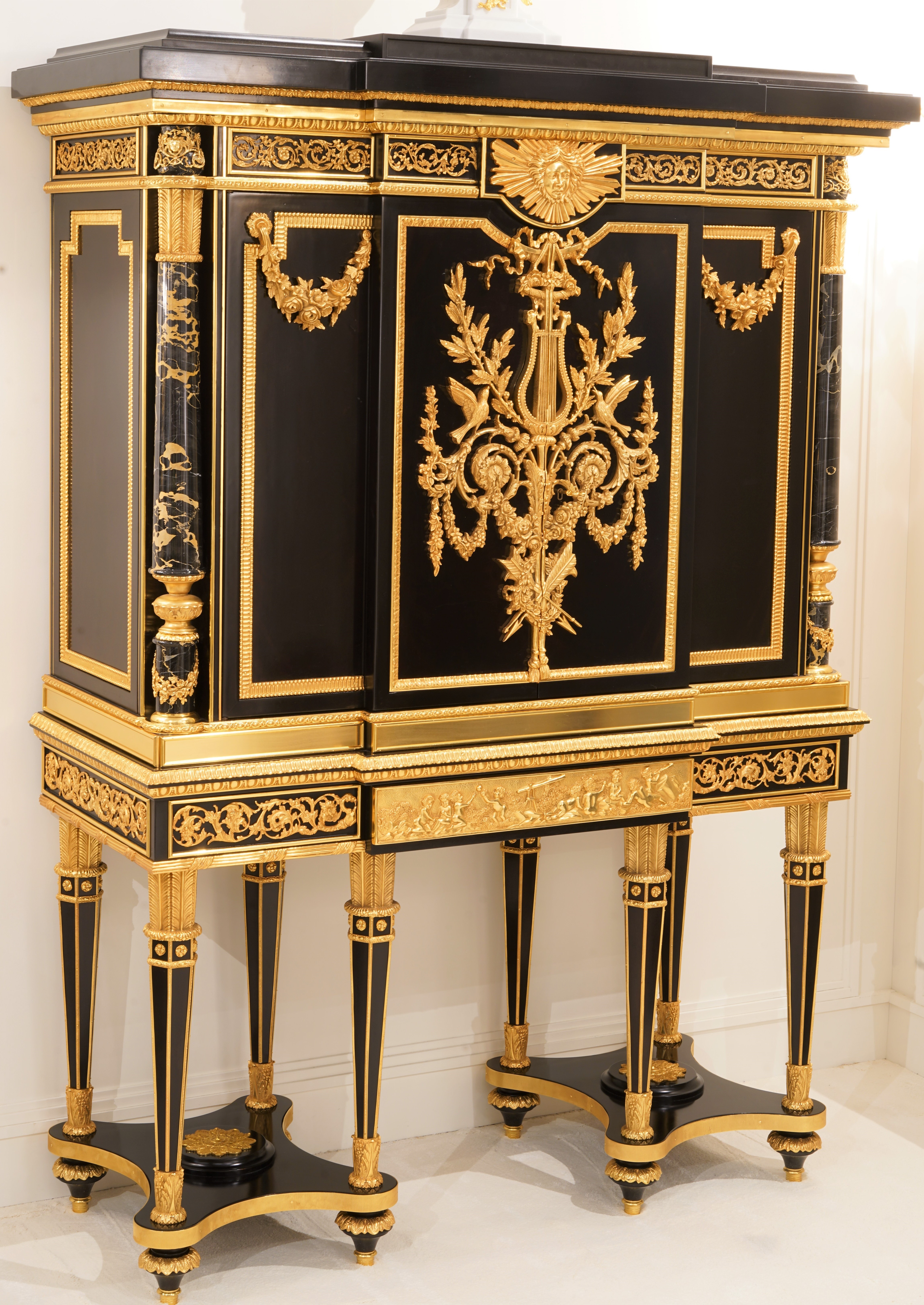 Breakfronts & China Cabinets Gorgeous Shadows of Gold Bar Cabinet from our furniture showpiece collection.