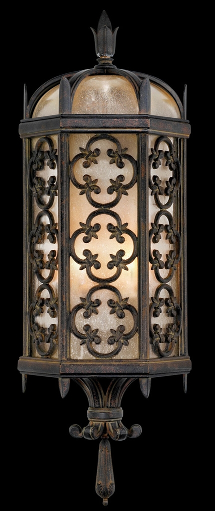 Lighting Wall sconce in stylized quatrefoil design features Marbella wrought iron
