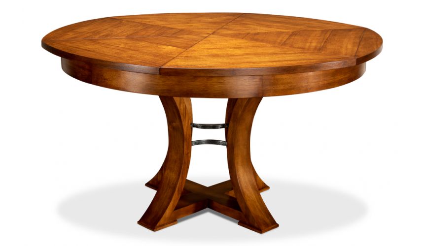 Transitional style round table with self storing leaves.