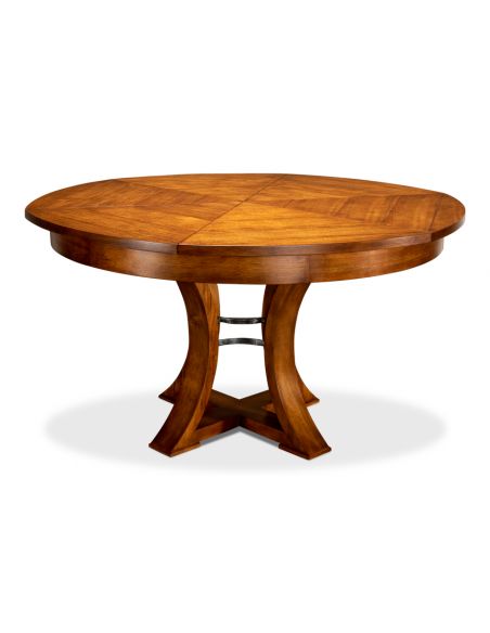 Transitional style round table with self storing leaves.