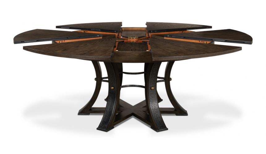 Large round table with self storing leaves.