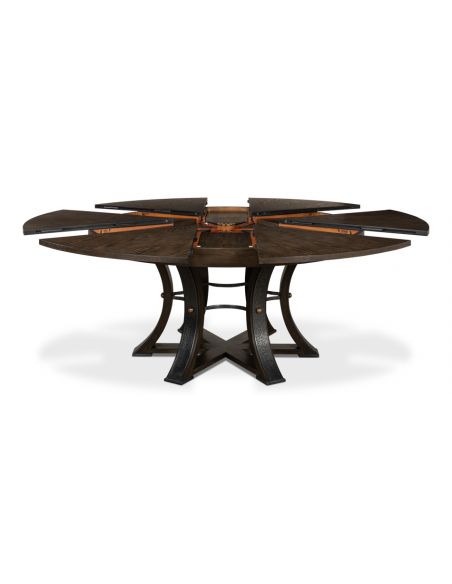 Large round table with self storing leaves.