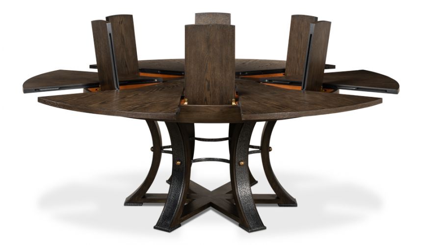 Large round table with self storing leaves.