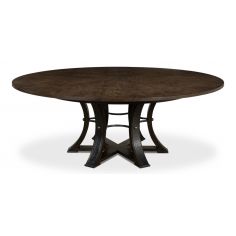 Large round table with self storing leaves.