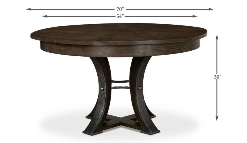 70-inch round table with self-storing leaves. Dark finish on oak wood