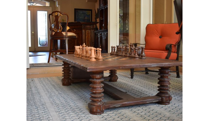 Turned leg heavy distressed games-coffee table.