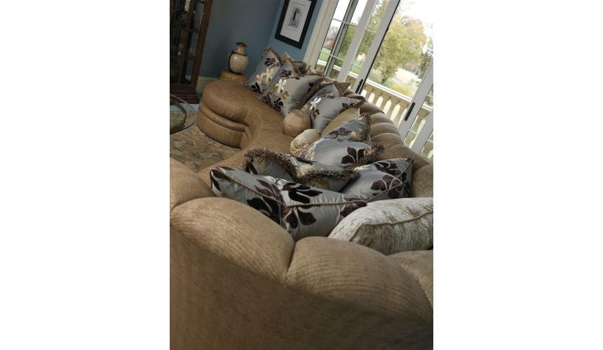 Sectional with curved lines and coordinating accent pillows