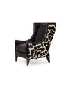 Stylish modern armchair covered in a mix of animal print fabrics and embossed leathers