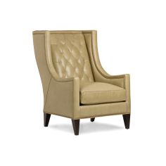 Stylish modern armchair covered in a mix of animal print fabrics and embossed leathers