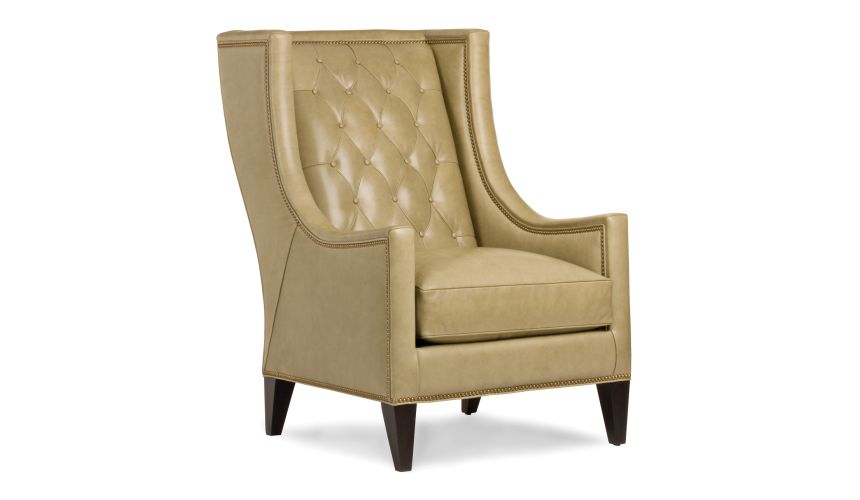 Stylish modern armchair covered in a mix of animal print fabrics and embossed leathers