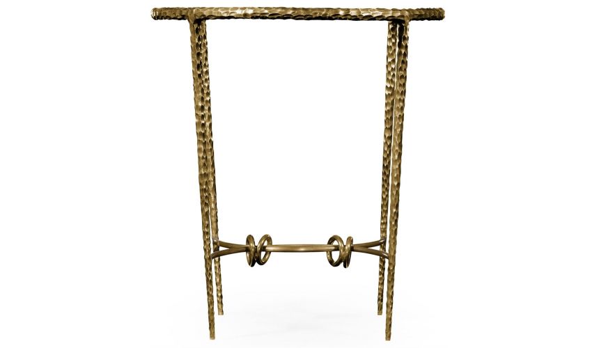 Patinated finish hammered brass circular side table.