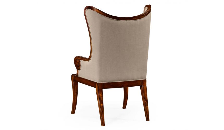 Walnut "butterfly" upholstered armchair.