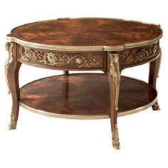 ROUND CAPITAL COCKTAIL TABLE