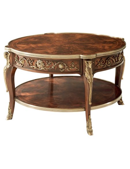 ROUND CAPITAL COCKTAIL TABLE