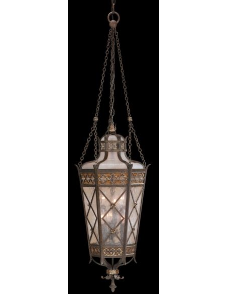 Large lantern of solid brass featuring a variegated rich umber patina
