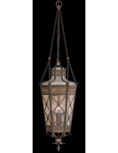 Medium lantern of solid brass featuring a variegated rich umber patina