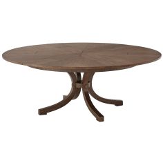 This round dining table has a transitional style, six pull-out sections, and six self-storing fold-out leaves 2
