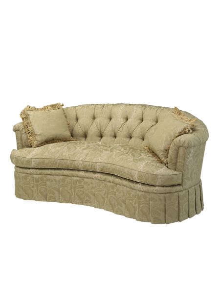 Curved back tufted sofa