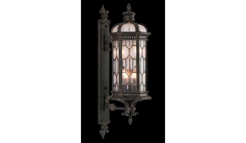 Lighting Small wall mount of antiqued bronze finish with subtle gold accents
