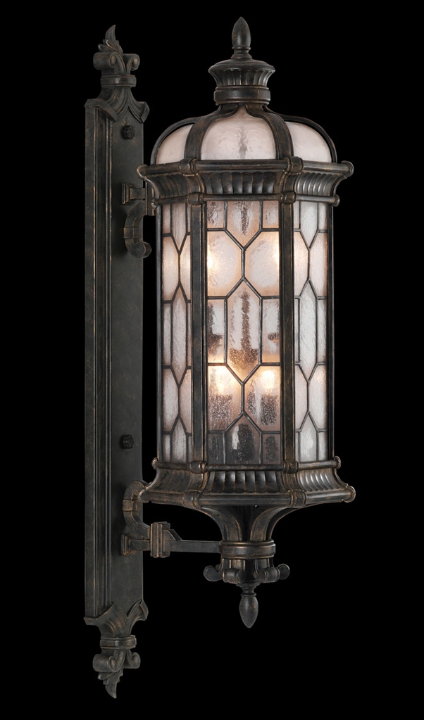 Lighting Small wall mount of antiqued bronze finish with subtle gold accents