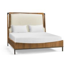 American walnut with a figured walnut veneer on the headboard.