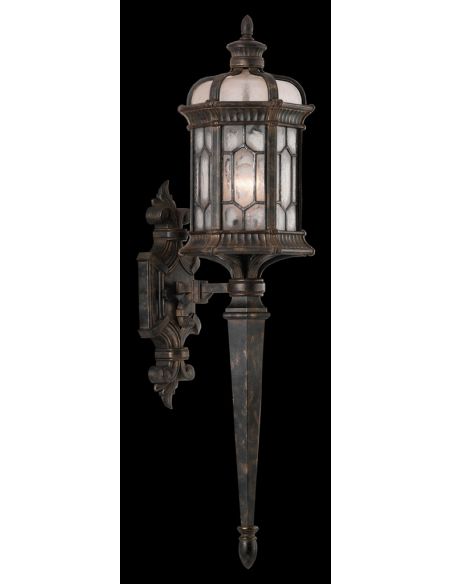 Small wall sconce of antiqued bronze finish with subtle gold accents
