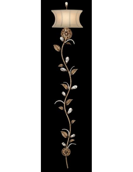 Wall sconce in cool moonlit patina. Classical foliage motif