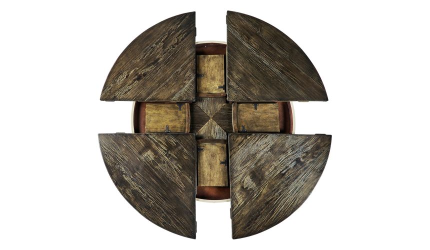 Walnut circular dining table with self-storing leaves
