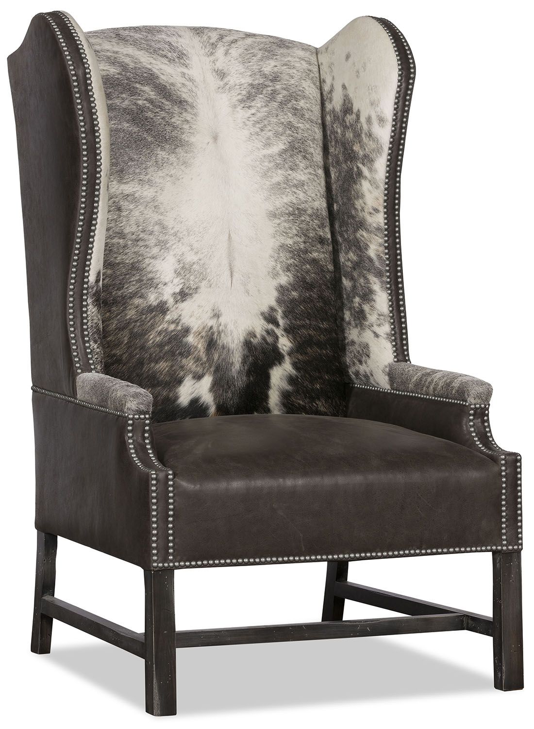 designer patterned wingback chair exemplifies strength and endurance