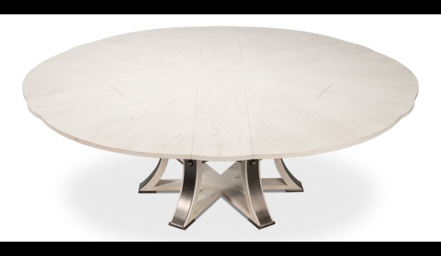Large round table with self storing leaves