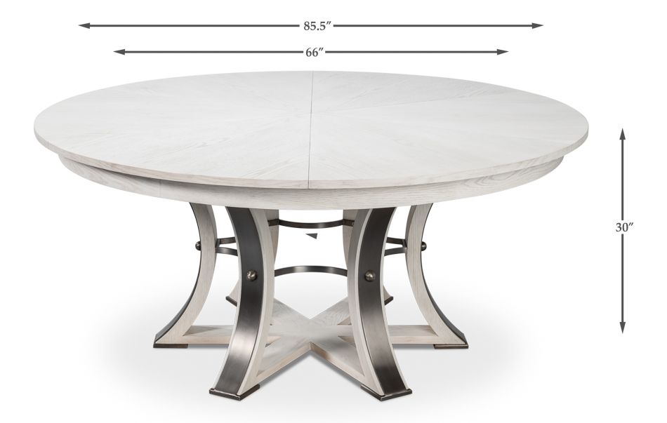 Large round table with self storing leaves