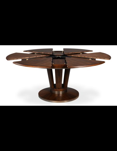 open, Jupe dining table with self-storing leaves. Palladio finish