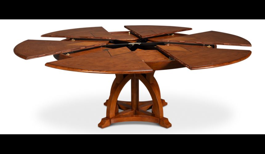 84 Jupe table self storing leaves, walnut, white oak center detail.