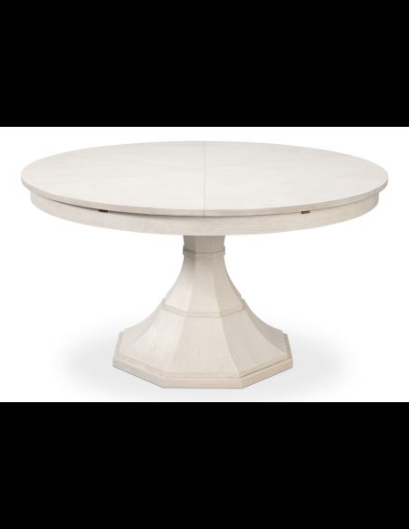 The Giselle Jupe Table is extendable and features a traditional touch with curves and facets on its base.