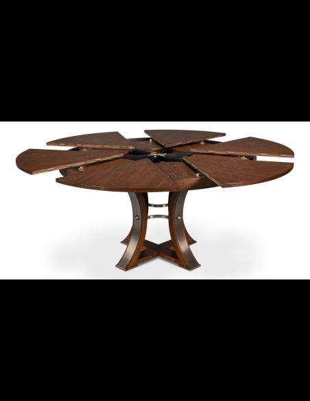 70-inch round table with self-storing leaves. Palladio finished on oak wood