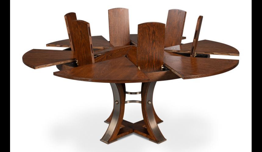 Round table with self-storing leaves. Palladio finish on oak wood