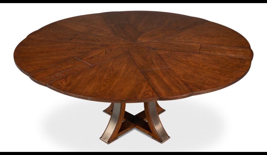 Round table with self-storing leaves. Palladio finish on oak wood