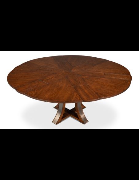 Round table with self-storing leaves. Palladio finish on oak wood