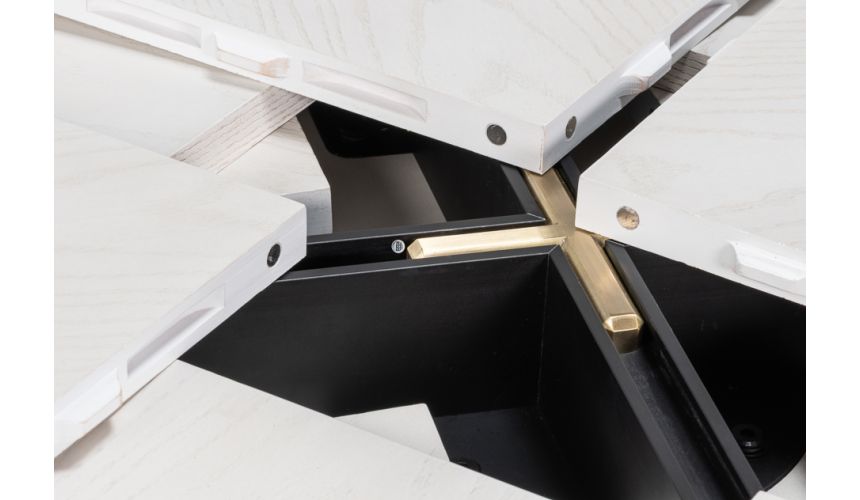 Small expandable white Jupe table with self-storing leaves