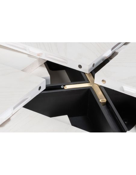 Small expandable white Jupe table with self-storing leaves