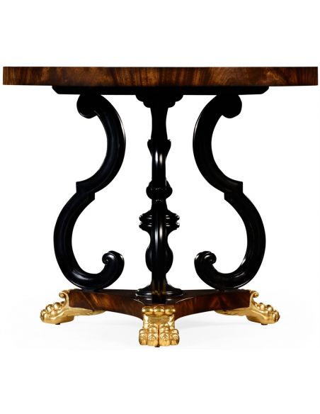 Foyer and Center Tables Mahogany centre table with gilt lions paw feet.