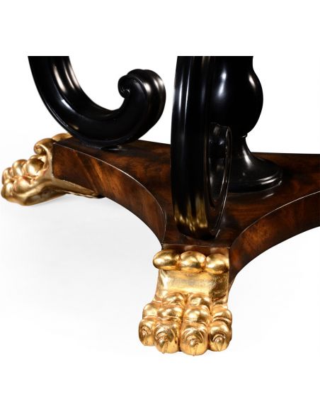 Foyer and Center Tables Mahogany centre table with gilt lions paw feet.