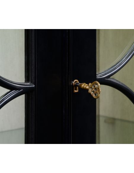 Breakfronts & China Cabinets Black display cabinet with circular pattern door