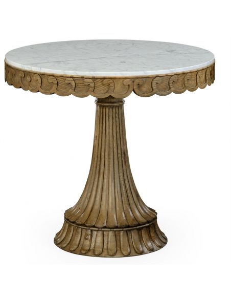 Carved oak table with marble top.