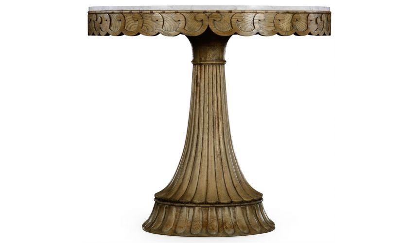 Foyer and Center Tables Carved oak table with marble top.