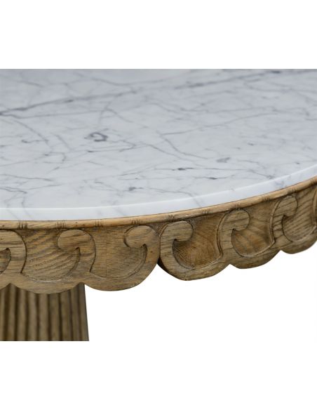 Foyer and Center Tables Carved oak table with marble top.