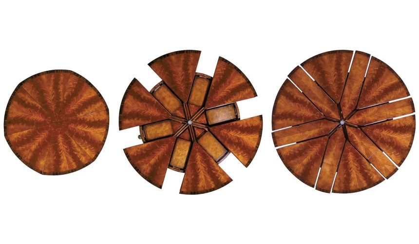 Dining Tables Circular extending mahogany dining table.