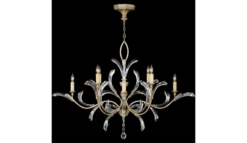 Lighting Chandelier in warm muted silver leaf finish. Features beveled crystal accents